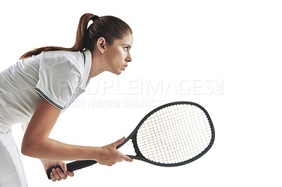 Buy stock photo Studio shot of a female tennis player holding a racket against a white background