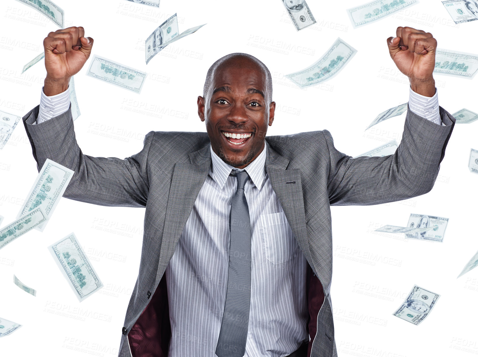 Buy stock photo Cropped portrait of a businessman cheering as money rains down against a white background