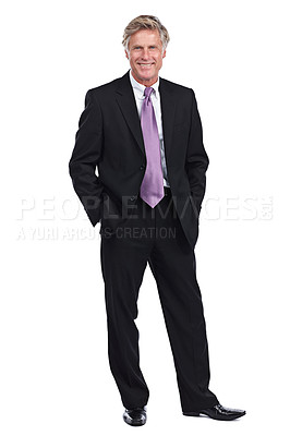 Buy stock photo Full length portrait of a businessman standing with his hands in his pockets against a white background