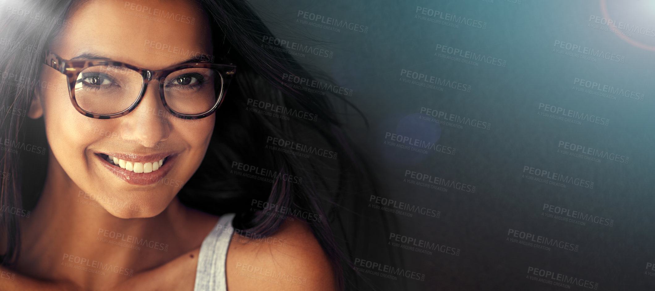 Buy stock photo Studio portrait of an attractive young woman wearing glasses