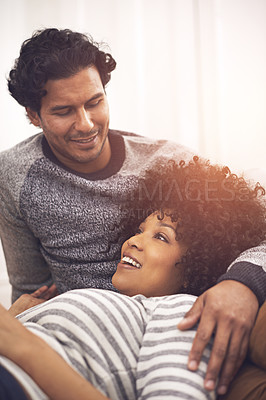 Buy stock photo Couple, couch and relax for care and talk in home, smile and proud of marriage and commitment. Happy people, conversation and cozy on sofa in lounge on weekend, support and trust in relationship