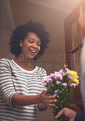 Buy stock photo Happy, flowers and woman with man by door for anniversary or romantic gift at apartment. Smile, love and young female person receiving bouquet of pink floral plants for surprise at modern home.