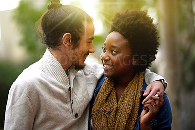 Buy stock photo Park, hug and happy interracial couple together with trees, sunshine and morning embrace with love. Romance, smile and outdoor date in nature, man and woman with diversity, connection and care.