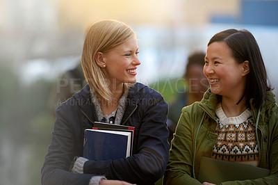 Buy stock photo Education, books and talking with woman friends outdoor on campus together for learning or development. Diversity, college or university with young student and best friend chatting at recess break