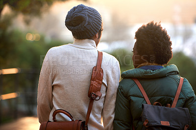 Buy stock photo Back view, university student and friends in outdoor on campus, contemplate and relax with backpack in cold weather. College, interracial and classmate for chill, think and plan for assignment.   