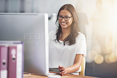 Buy stock photo A cropped shot of a businesswoman working at her desk