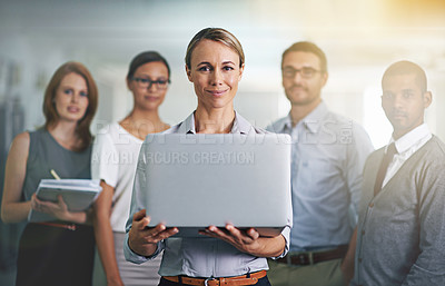 Buy stock photo Laptop, happy woman and team leader with business people in portrait at office for staff in cooperation together. Face, computer and professional group of employees, consultants and collaboration