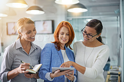 Buy stock photo Collaboration, tablet and strategy with a business team doing research together in their office at work. Teamwork, planning and corporate partnership with a women employee group working online