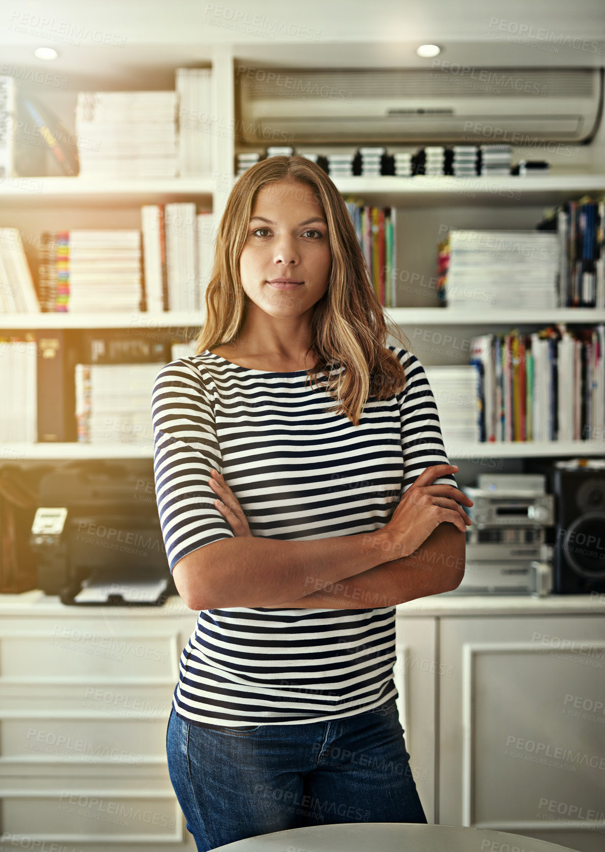 Buy stock photo Woman, portrait and writer in home office, arms crossed and bookshelf for editing fiction. Female person, literature agent and proud of novel collection, confident and independent startup company