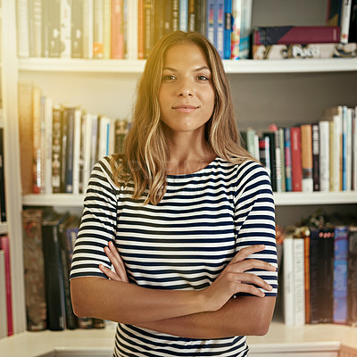 Buy stock photo Portrait of a woman standing in front of bookshelves in her home office