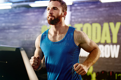 Buy stock photo Gym, serious and man with running on treadmill for exercise, endurance workout and cardio health. Male person, athlete and training with machine for energy, body wellness and speed at fitness centre