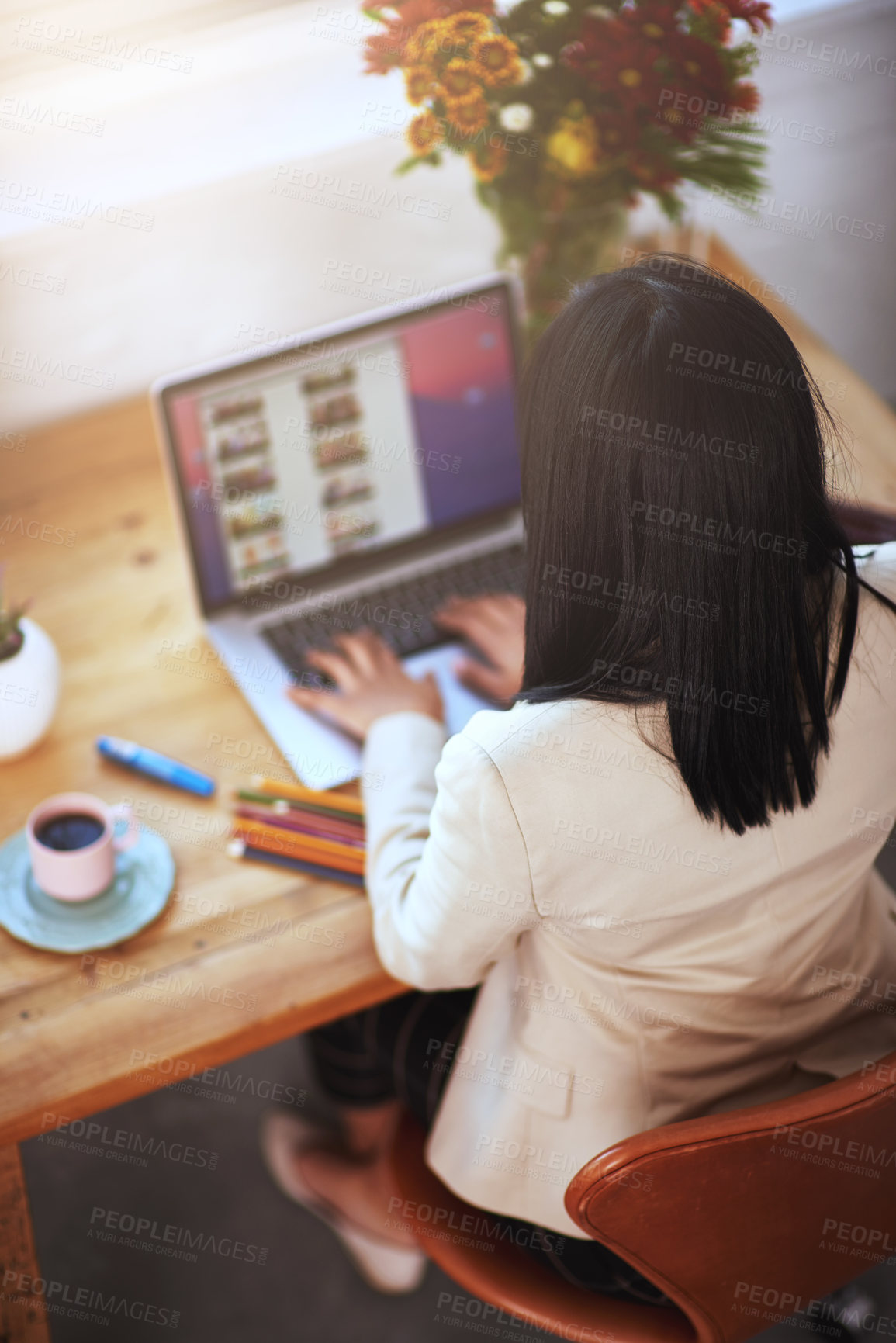 Buy stock photo Shot of a woman working at her laptop in a home office