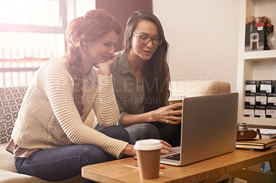 Buy stock photo Coffee shop, meeting and business women on laptop for conversation, talking or discussion for remote work. Freelance, teamwork and people on computer for internet, research and website in restaurant