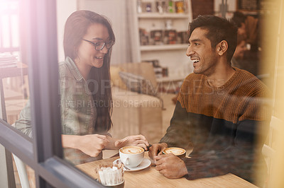 Buy stock photo Coffee shop, date and and couple with drink in conversation, talking and chatting for bonding. Love, happy and man and woman with caffeine, cappuccino and beverage in restaurant, cafe and store