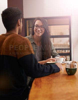 Buy stock photo Coffee shop, love and couple on date with drink in conversation, talking and chatting for bonding. Relax, happy and man and woman with caffeine, cappuccino or beverage in restaurant, cafe and store