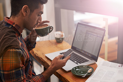 Buy stock photo Laptop, phone and man in coffee shop in morning typing for online message, email and social media. Cafe, restaurant and person on cellphone for communication, networking and website for remote work