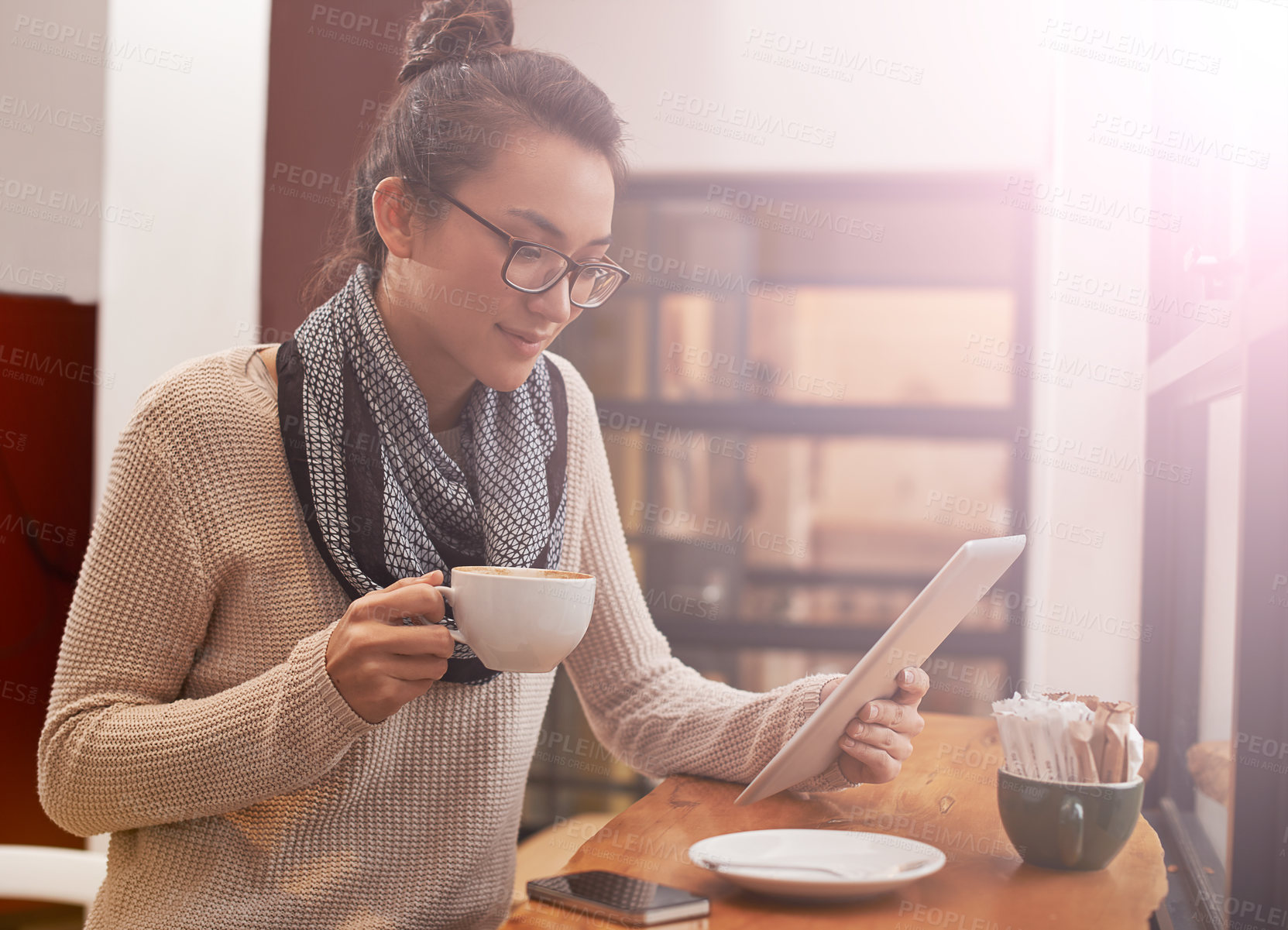 Buy stock photo Woman, coffee shop and tablet with freelancer research and social media in cafe with cappuccino. Website, drink and internet with digital blog writer and technology at restaurant with tea and reading