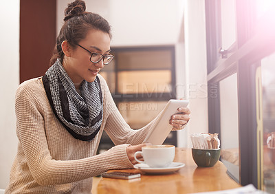 Buy stock photo Woman, coffee shop and tablet reading with creative freelancer work and social media in cafe. Website, drink and internet with digital blog writer and technology at restaurant with tea and lens flare