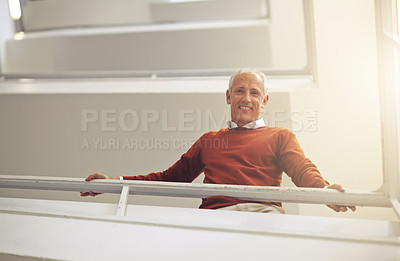 Buy stock photo Low angle, business and portrait with man, stairs and creative agency with professional and PR consultant. Face, mature person and employee with happiness and entrepreneur with steps and startup