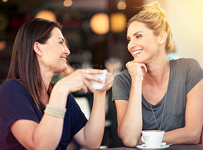 Buy stock photo Conversation, cafe and female friends drinking coffee together while talking and bonding for gossip. Happy, smile and women speaking, laughing and enjoying a warm beverage at a restaurant in the city