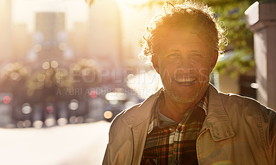 Buy stock photo Portrait of a happy mature man in the city