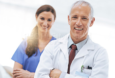 Buy stock photo Doctor, nurse and partner in portrait with arms crossed, medical support and wellness at hospital. Medic, mature man and woman in team, happy and healthcare services at clinic with pride for career