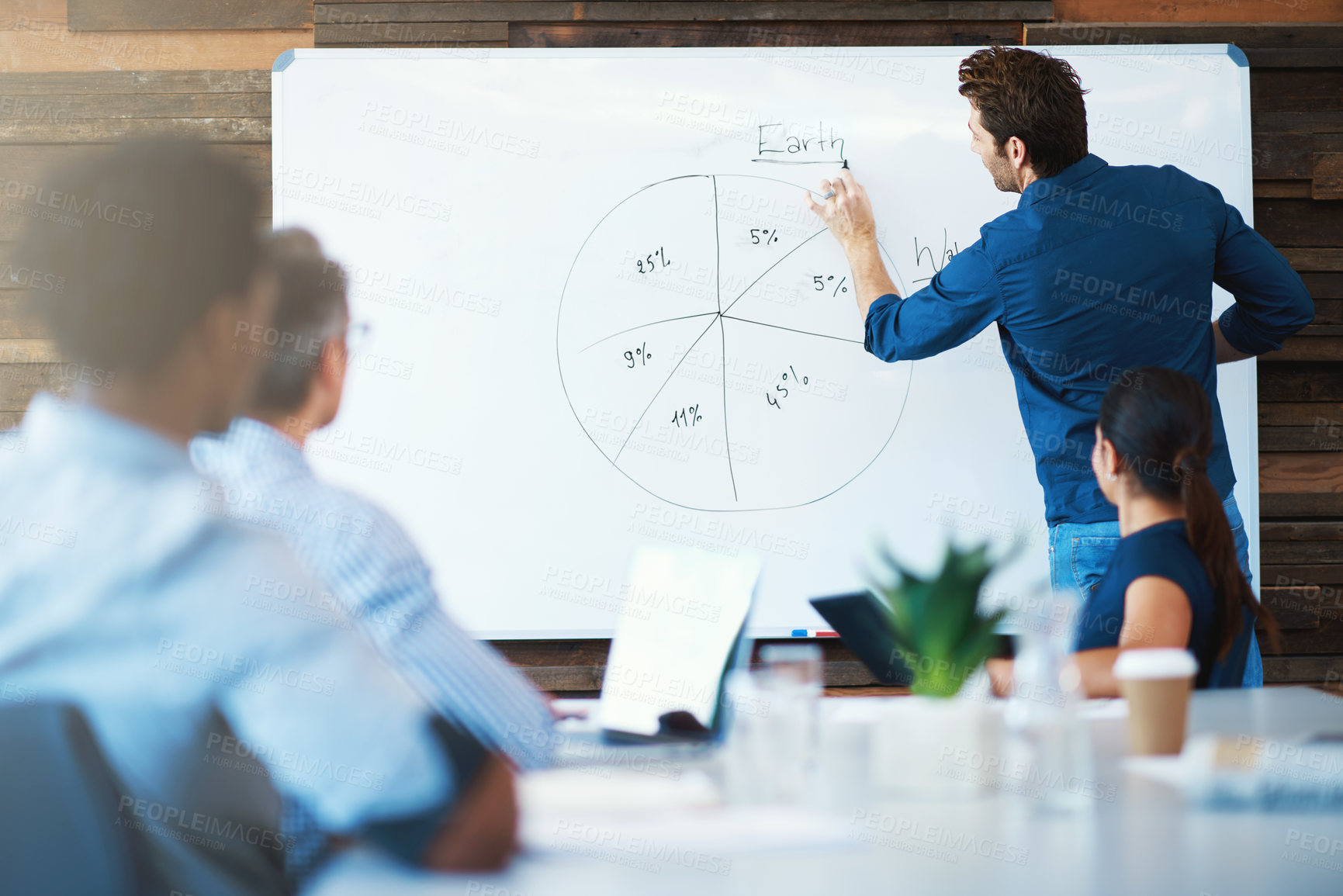 Buy stock photo Data review, businessman with a graph on a whiteboard and in boardroom of his workplace with colleagues. Collaboration or teamwork, planning or results and coworkers together at a workshop at work