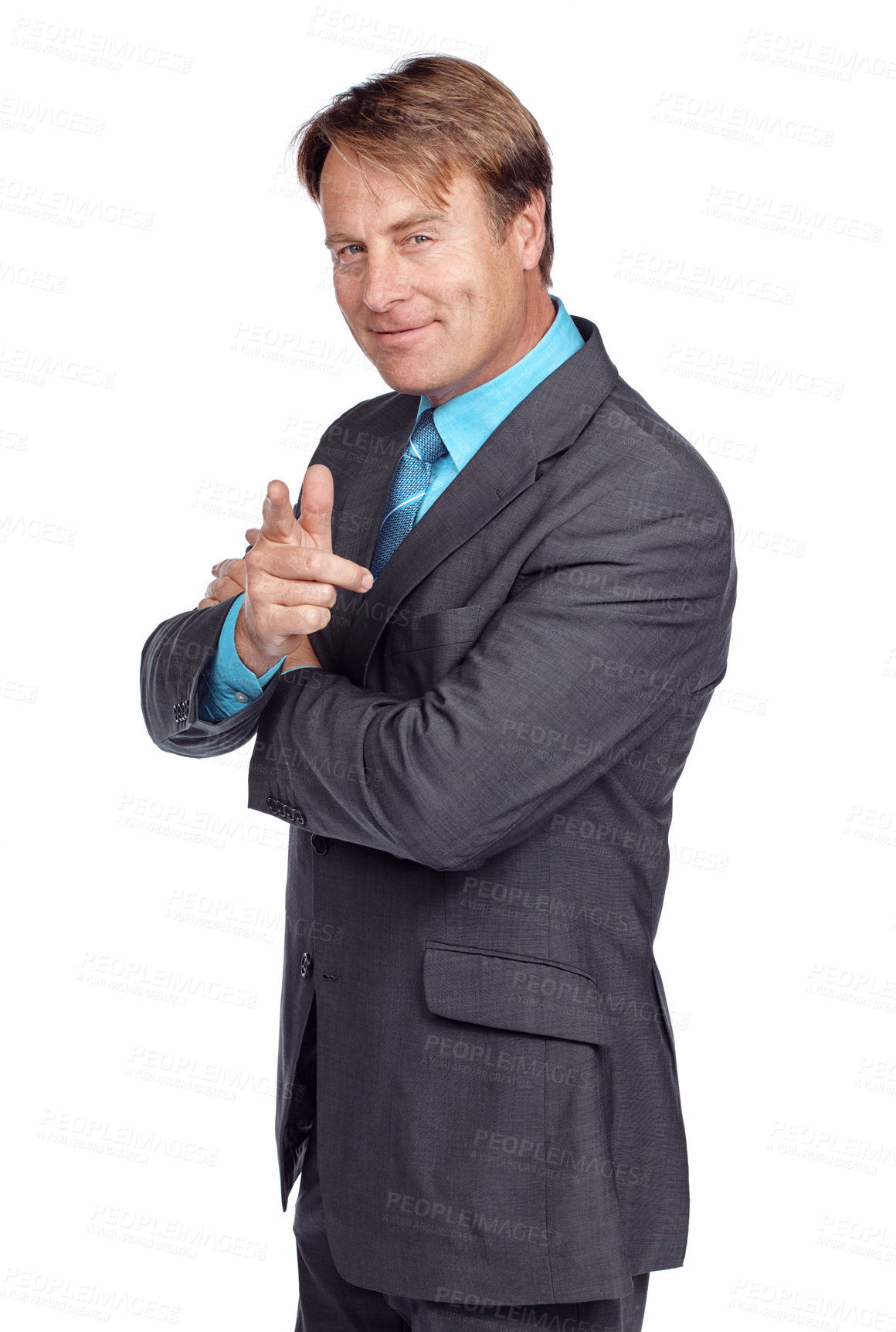 Buy stock photo Businessman, smile and pointing in studio portrait with suit, focus or success in leadership by white background. Happy corporate leader, vision or isolated for executive goal, mission and motivation