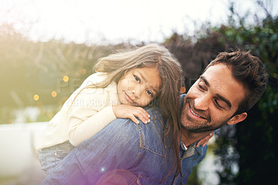 Buy stock photo Happy, piggyback and playful with father and daughter in nature for bonding, family and affectionate. Smile, relax and happiness with man carrying young child in park for support, weekend and care