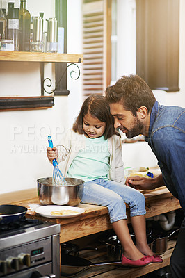 Buy stock photo Cooking, help and father with daughter in kitchen for pancakes, bonding and learning. Food, morning and breakfast with man and young girl in family home for baking, support and teaching nutrition