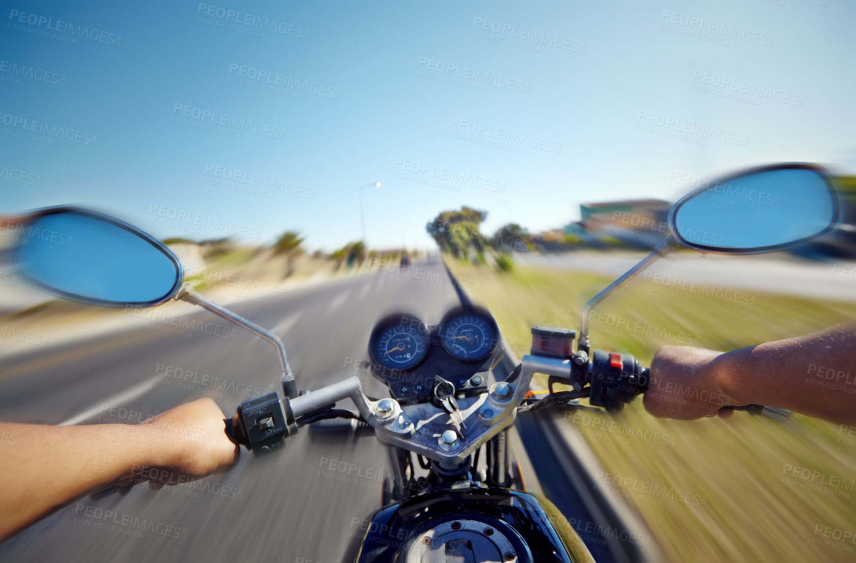 Buy stock photo Motion blur POV of motorcyclist riding a motorcycle on a highway. Adrenaline junkie, daredevil man traveling and commuting fast down road or street on weekend. Enjoying freedom, motorbike on freeway