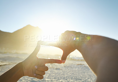 Buy stock photo Pov, hands and frame with sunshine, beach and wellness with sky, getaway and memory of ocean getaway. Closeup, hand and person with sunlight, seaside holiday and summer vacation on a tropical island