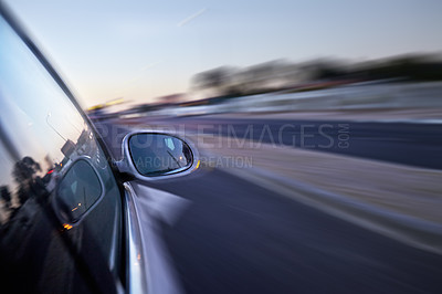 Buy stock photo Car, mirror and moving on highway in road with speed, travel and driving fast for race or emergency. Vehicle, transport and motion blur in hurry on freeway, street and rush to work with insurance 