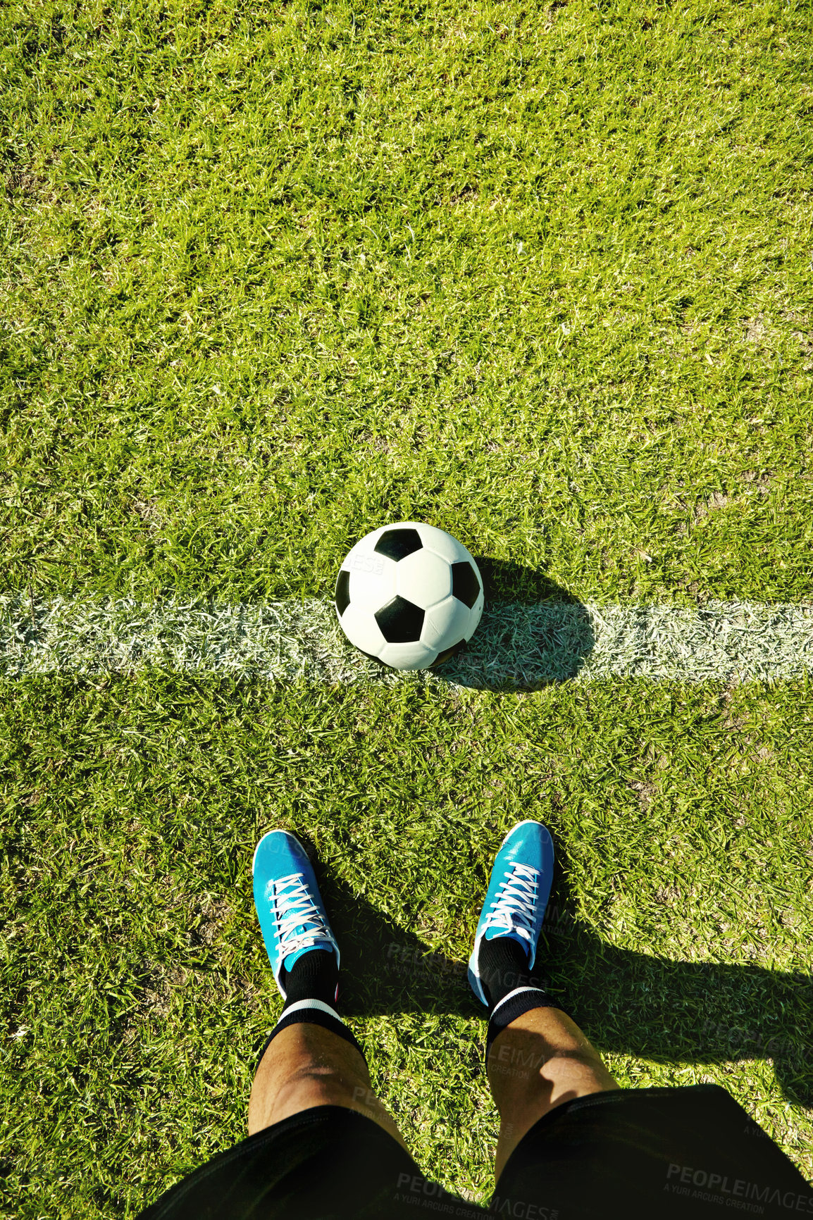 Buy stock photo POV shot of a soccer player standing on the field