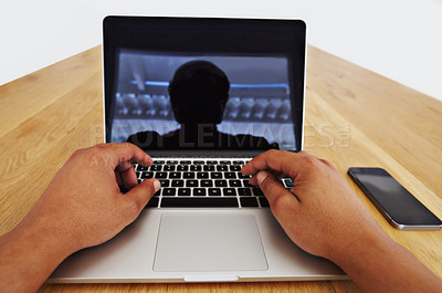 Buy stock photo POV of a person using a laptop with blank screen while sitting at a desk with a smartphone. One man typing on a modern wireless computer using latest 5g internet connection for freelance business