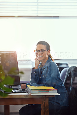 Buy stock photo Cropped portrait of a businesswoman working at her desk