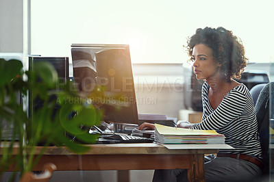 Buy stock photo Cropped shot of a businesswoman working at her desk
