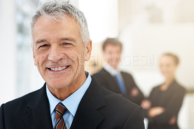 Buy stock photo Business man, executive and smile in portrait, leadership for team at consulting agency with confidence and pride. Senior management, CEO in workplace and consultant at company for corporate career