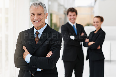 Buy stock photo Business man, executive and arms crossed in portrait, leadership for team at consulting agency with confidence and pride. Senior manager, CEO with smile and consultant at company for corporate career