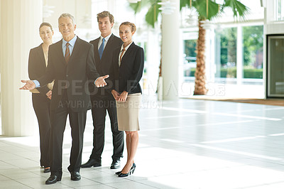 Buy stock photo Leader, portrait and business people in a lobby, collaboration and smile with property management and cooperation. Group, manager or employees with teamwork or partnership with real estate agency