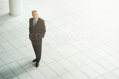 Buy stock photo Executive, portrait and smile in office building with confidence for finance of business idea. Employee, happy and professional in suit at workplace, staff and proud of company and high angle
