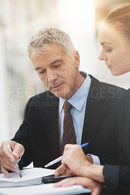Buy stock photo Boss, planning and talking to employee in office for strategy with notebook and brainstorming. Woman, conversation and  collaboration with CEO of corporate company for business with discussion