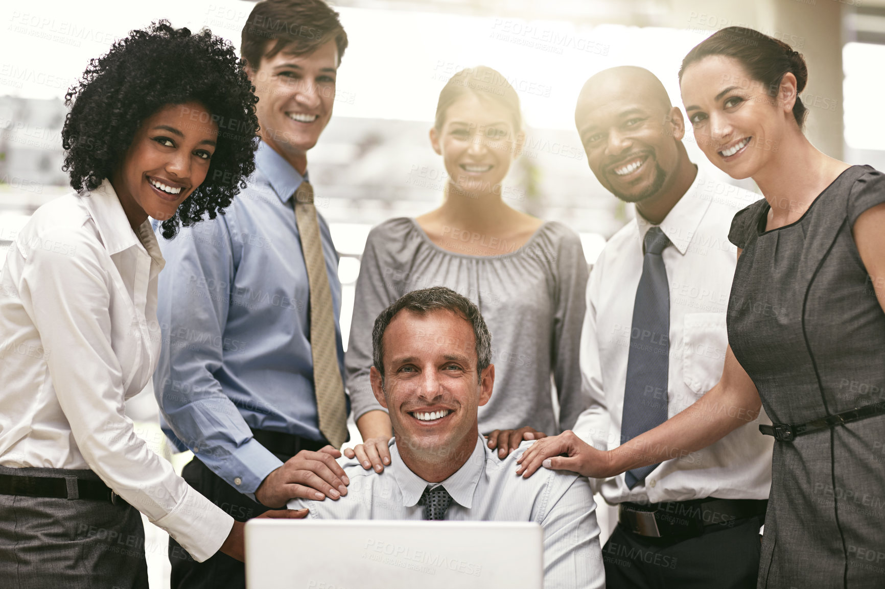 Buy stock photo Cropped shot of a group of businesspeople in their office