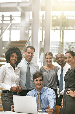 Buy stock photo Cropped shot of a group of businesspeople in their office