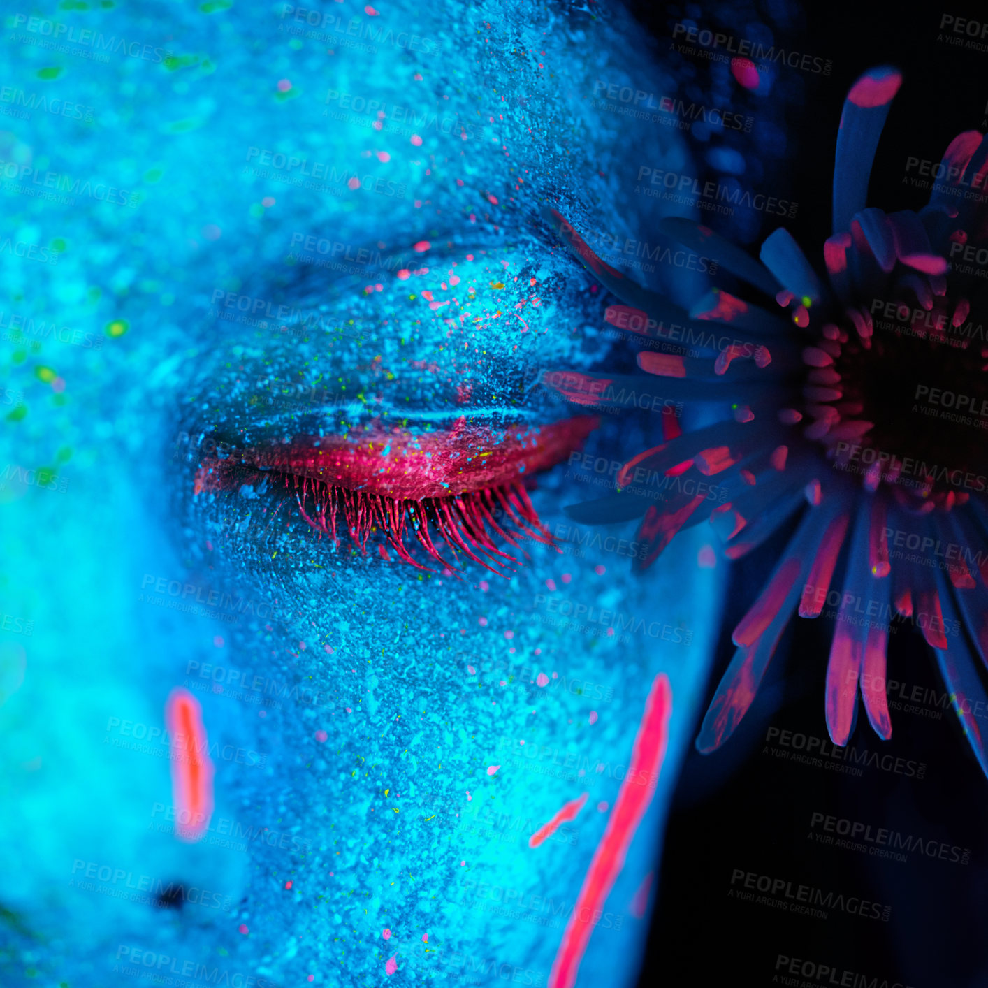 Buy stock photo Shot of a young woman posing with neon paint on her face