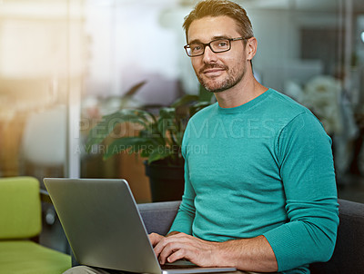 Buy stock photo Cropped portrait of a businessman working on his laptop