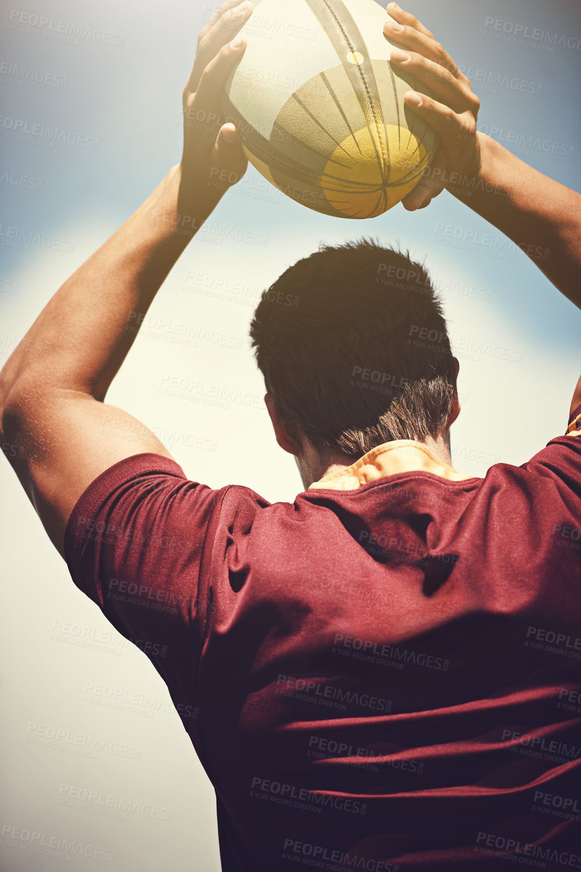 Buy stock photo Rugby ball, sports and man outdoor to play a game, throw and score a goal. Headshot of a male athlete person playing in sport competition or training for fitness, workout or exercise from behind