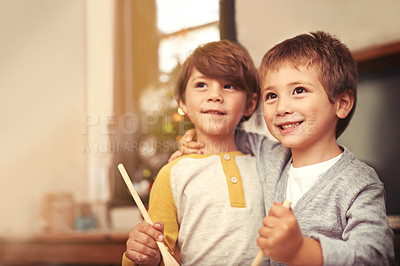 Buy stock photo Children, baking and thinking in kitchen with spoon and creative with ingredients for christmas cake. Boys, bonding together and care for cookies in house and pastry recipe for holiday celebration
