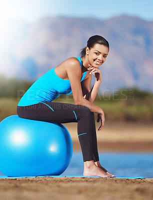 Buy stock photo Woman, portrait and smile on yoga ball in nature or pilates stretching to lose weight, balance or mobility. Female person, face and outside at lake for health workout or exercise, fitness or mountain