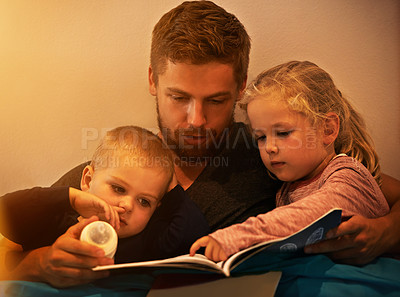 Buy stock photo Night, kids or father reading book in home for learning, education or storytelling in a house for care. Family, relax or dad with children siblings for a fantasy with a girl, boy or support for love